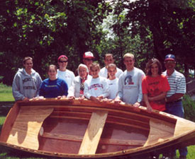 small wooden sailboat building